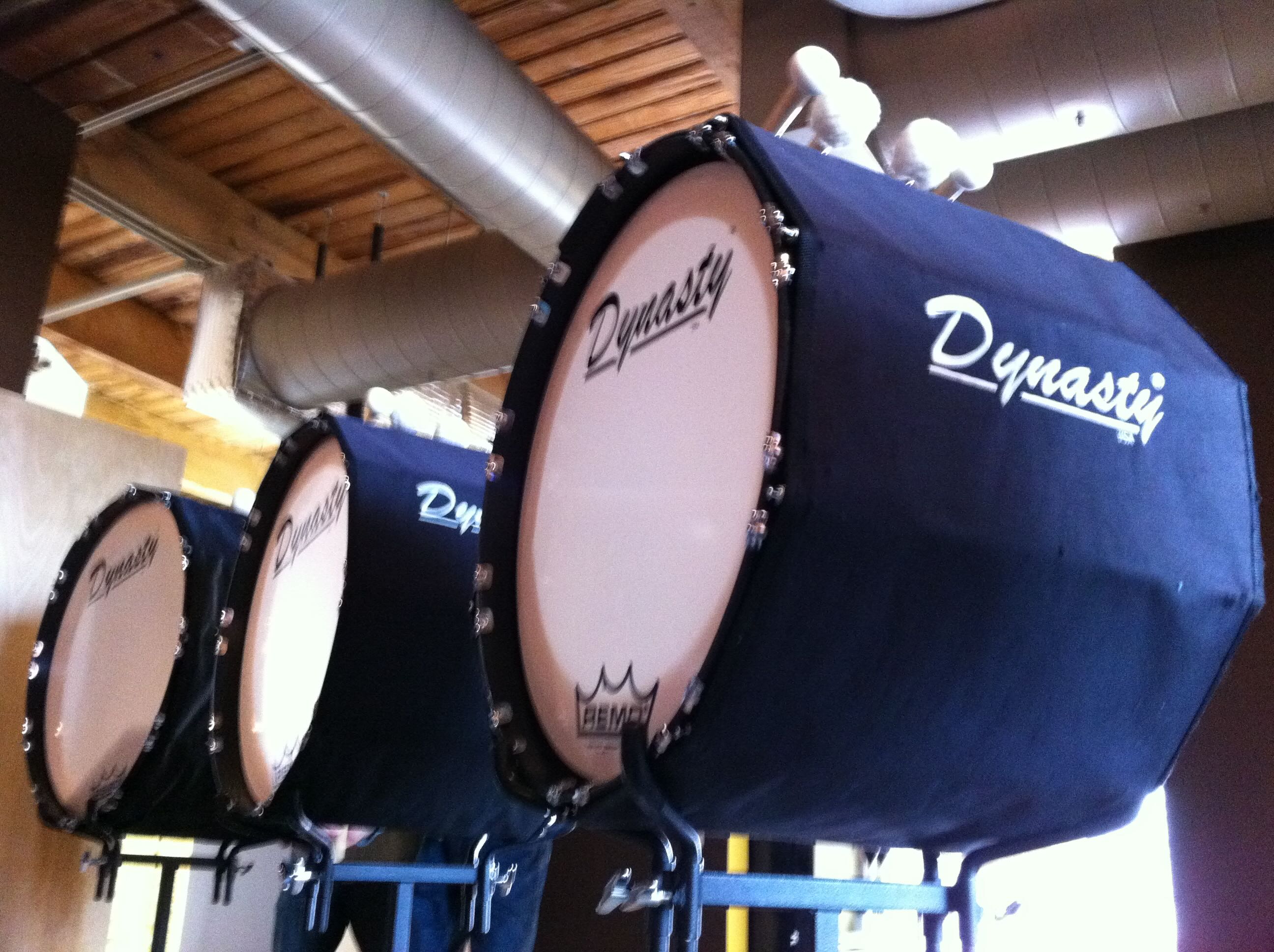 A row of Dynasty marching bass drums in the River North recording studio