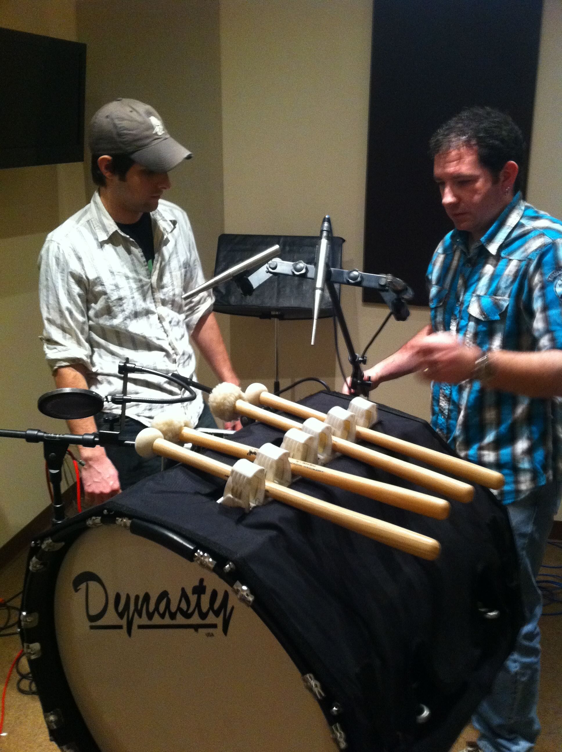 The recording crew arranging bass drum mallets and microphones at NoiseFloor